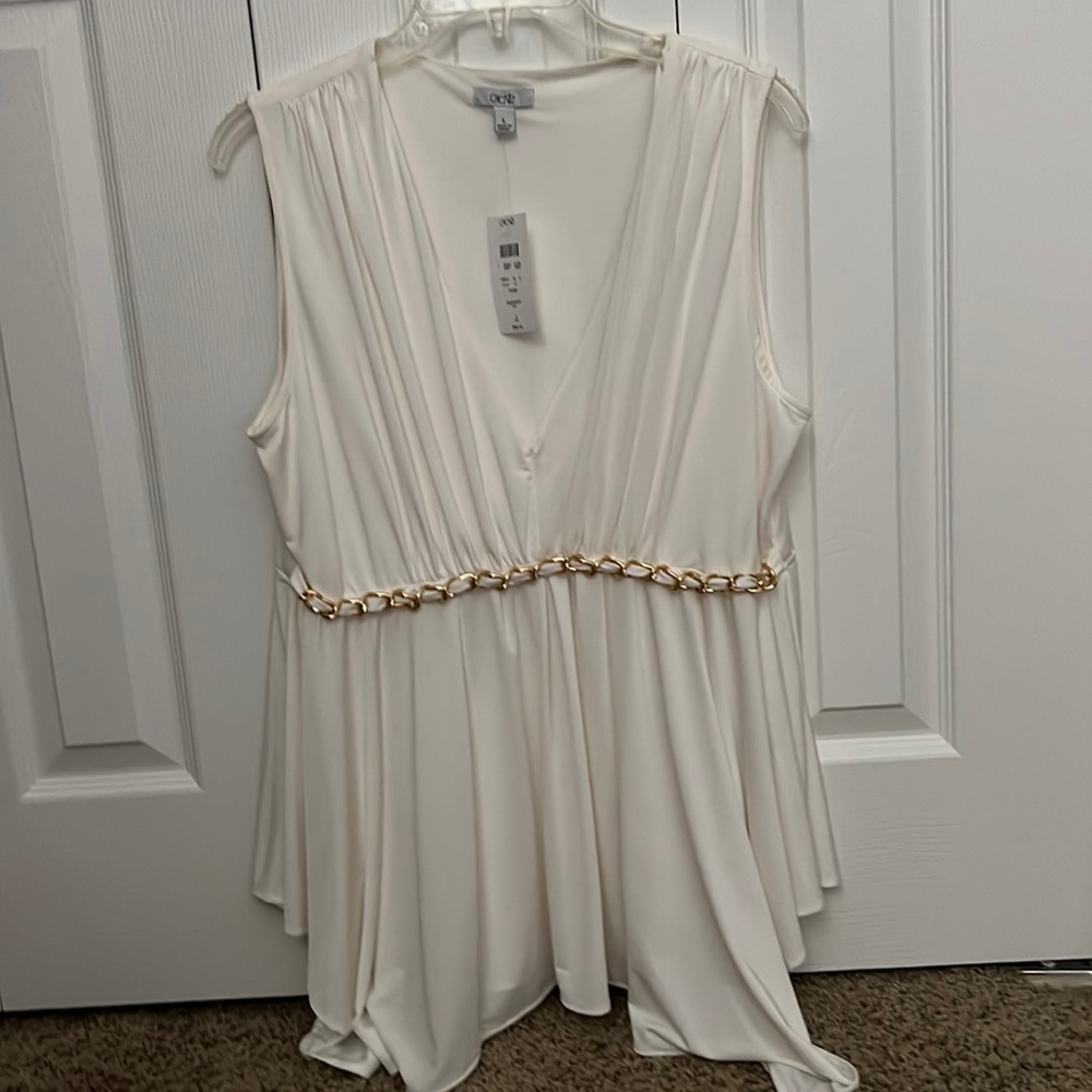 Offwhite Cache shirt with gold detail in the middle. New size large